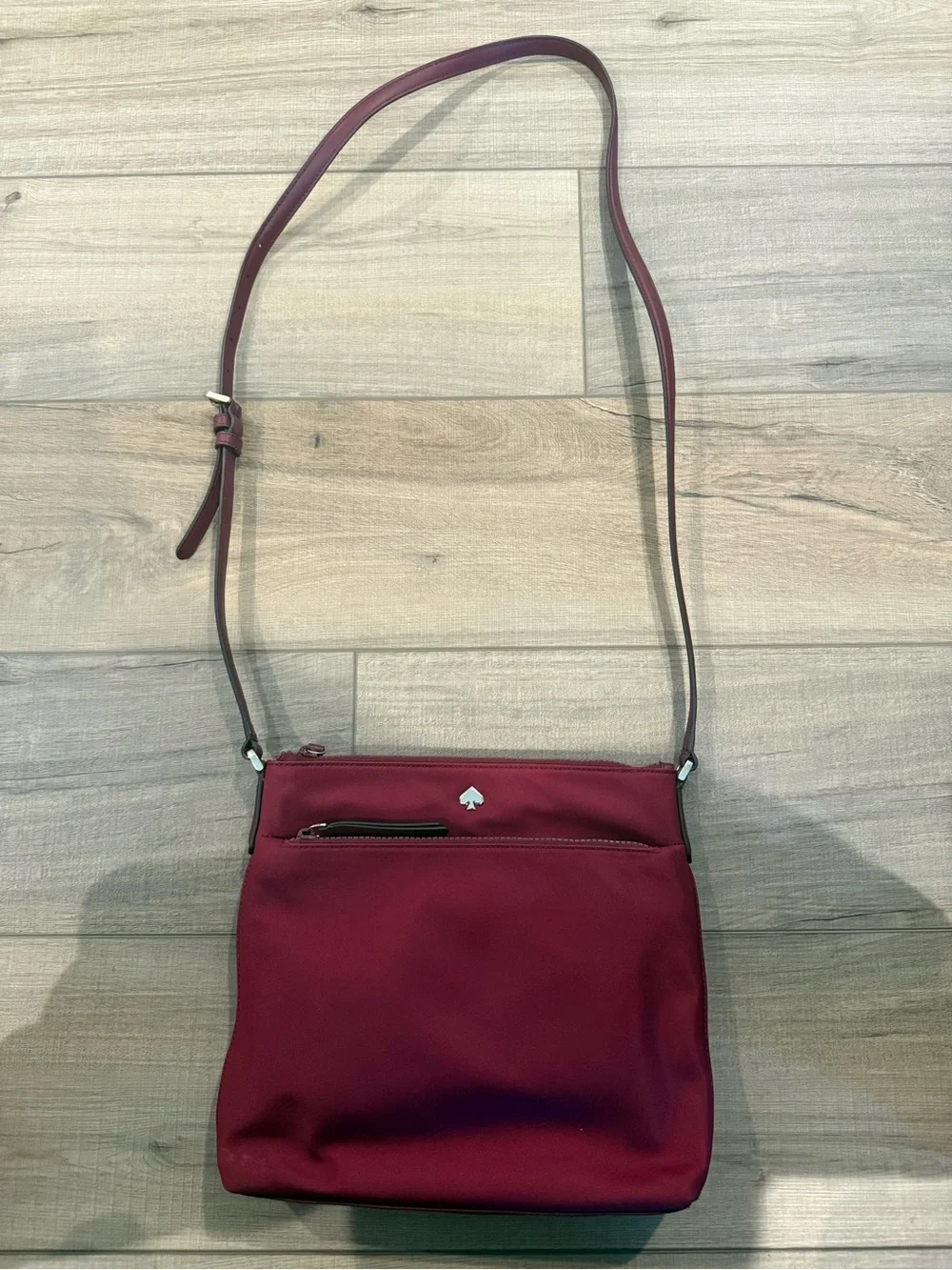 Kate Spade New York Burgundy Jae Flat Crossbody Bag